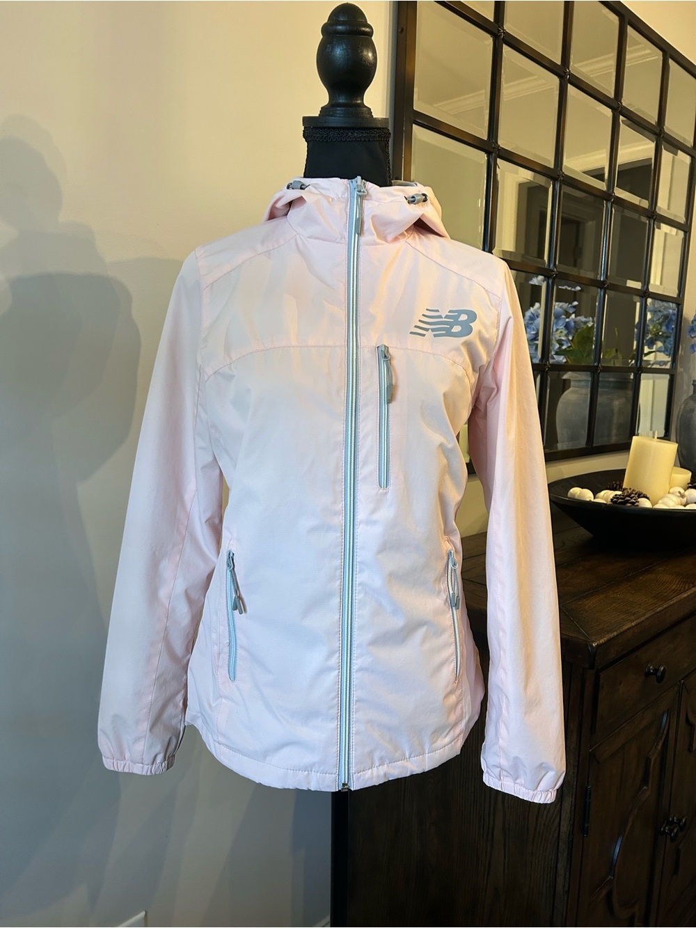 New Balance light pink lightweight hooded windbreaker jacket